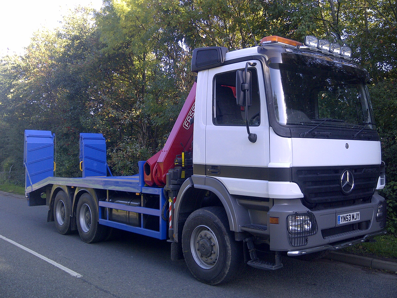 Malpas Tractors asked us to fit them a Fassi crane and remote hydraulic winch. They also asked us to make and fit a folding hydraulic ramp.