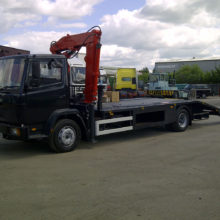We built and fitted a beaver tail body with Hiab crane onto this Mercedes to enable it to transport cars.